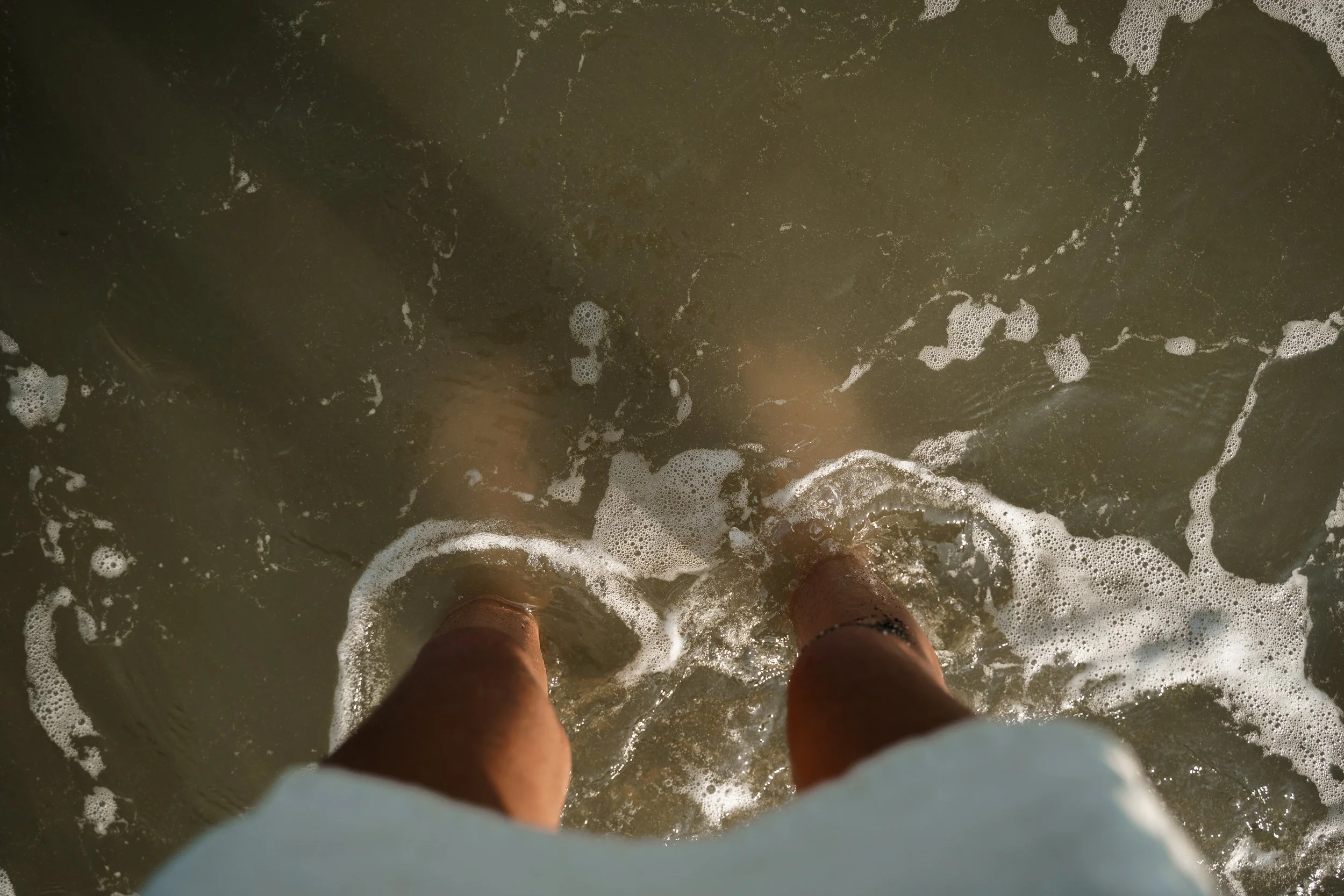 Standing where the water meets the shore